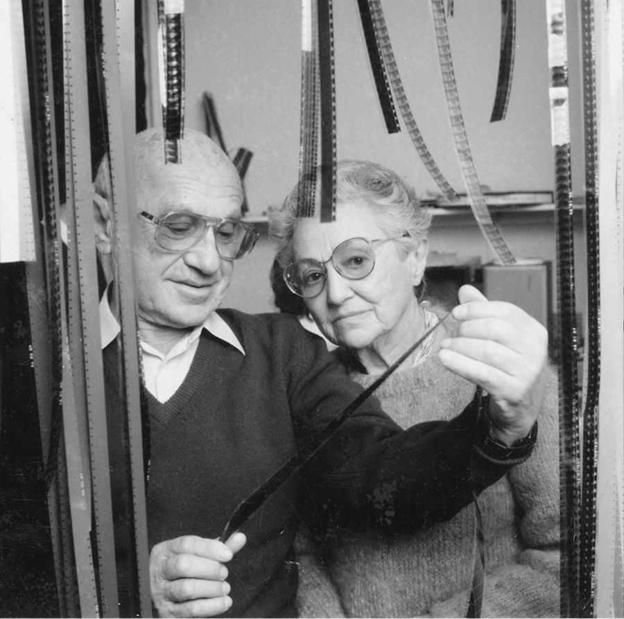 Photograph of Milton and Rose Friedman with motion picture film from 1980. From the Milton Friedman Papers, Hoover Institution Archives.