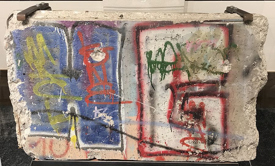 Photograph of a fragment of the Berlin Wall, concrete, paint, and steel rebar, from 1989. From the German Subject Collection, Hoover Institution Archives.