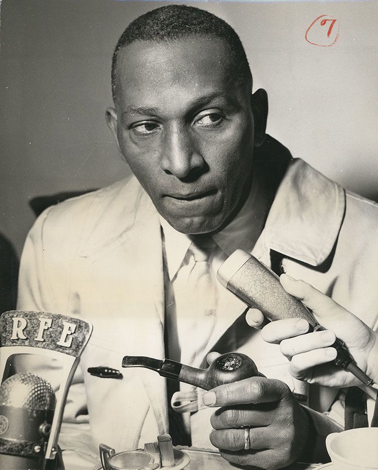 Photograph of interview with Cozy Cole, no date. From the Radio Free Europe/Radio Liberty Corporate Records, Hoover Institution Archives.